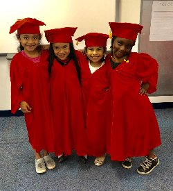 Picture of LHS students wearing a cap and gown for graduation.